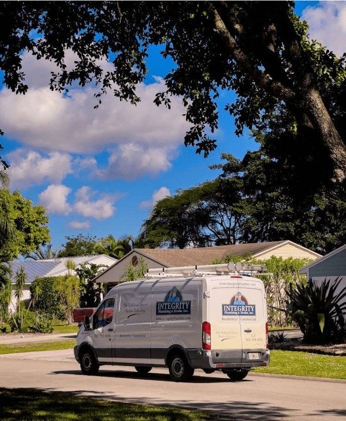 Plumber using a camera to inspect drain pipes