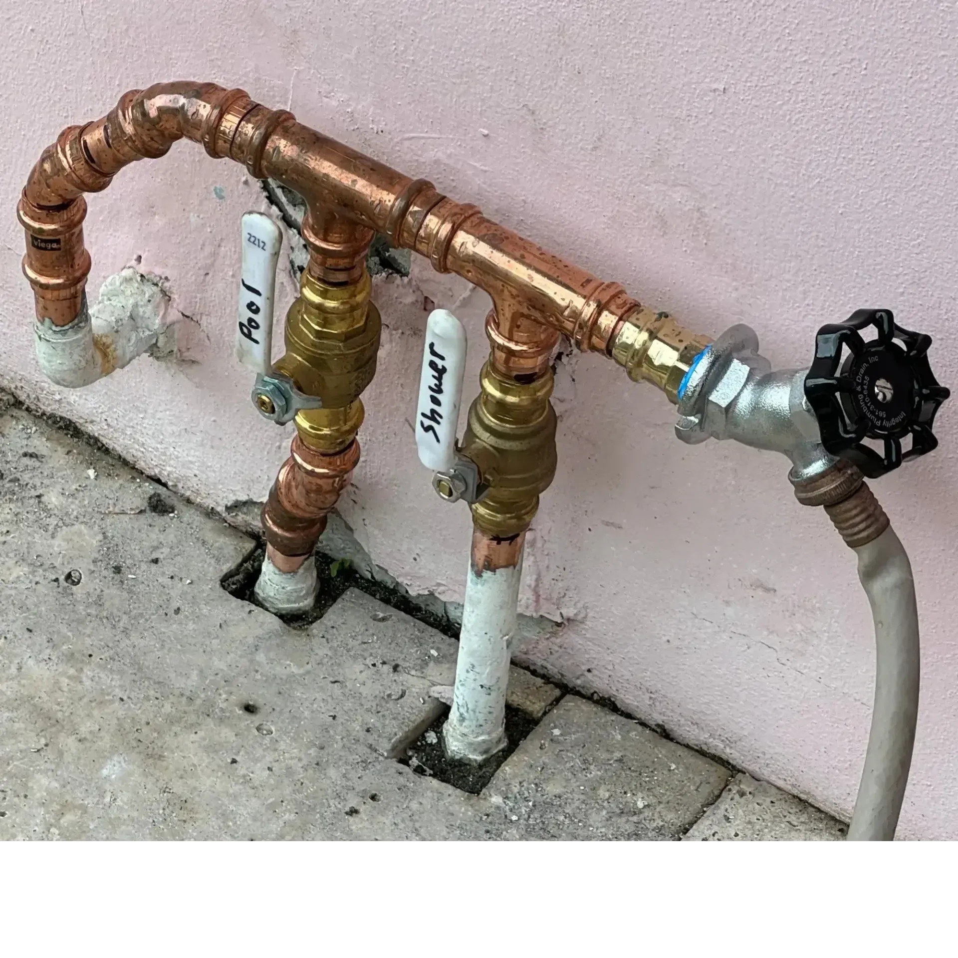 Old exterior piping before replacement