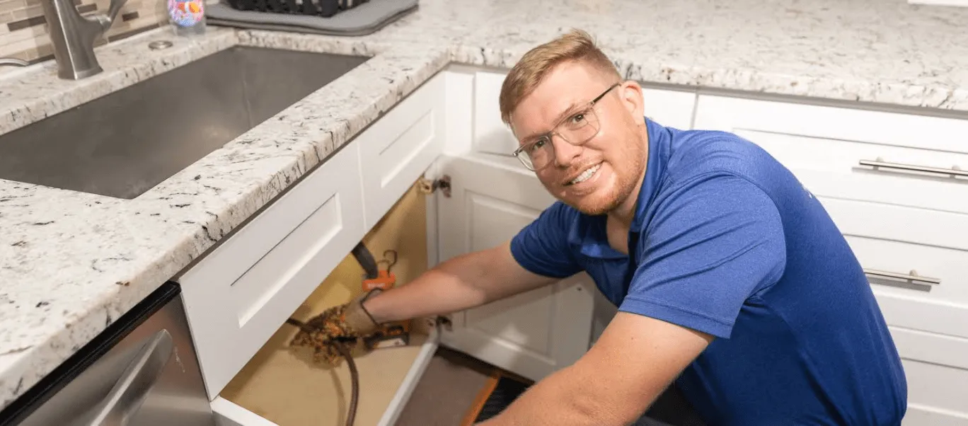 Under-sink repair in progress